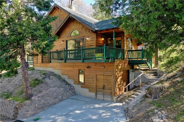 29278 Pine Dr, Cedar Glen, CA 92321 - rustic home featuring stairs and a chimney