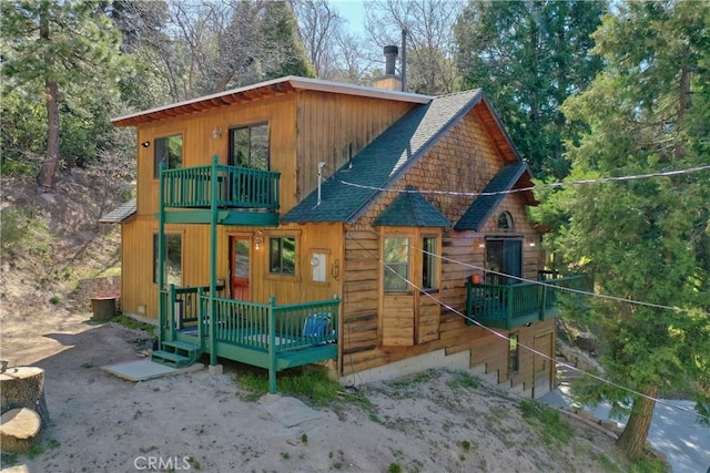 29278 Pine Dr, Cedar Glen, CA 92321 - view of front of property featuring a balcony and a shingled roof