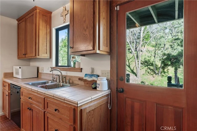 29278 Pine Dr, Cedar Glen, CA 92321 - kitchen featuring white microwave, a sink, dishwasher, and tile counters