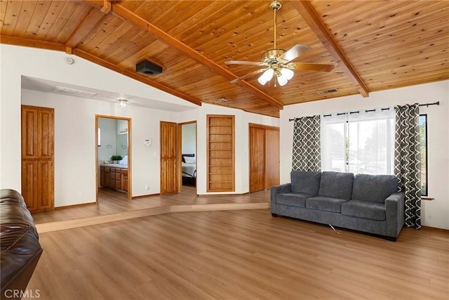 22975 Flournoy Ave, Corning, CA 96021 - living area featuring lofted ceiling with beams, wood ceiling, light wood-style floors, and ceiling fan
