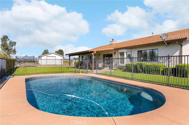 22975 Flournoy Ave, Corning, CA 96021 - view of swimming pool featuring a fenced in pool, a lawn, and fence