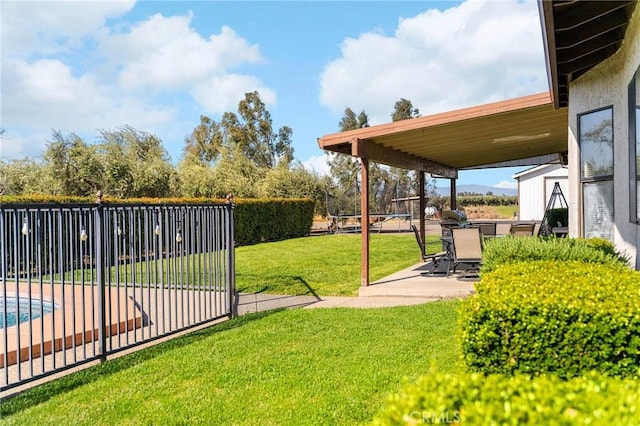 22975 Flournoy Ave, Corning, CA 96021 - view of yard featuring fence, a patio area, and a fenced in pool