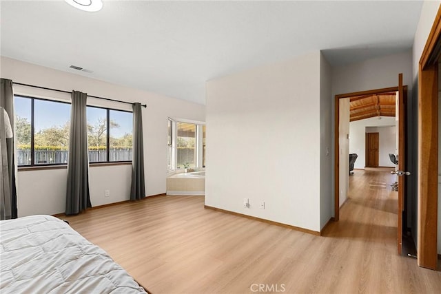 22975 Flournoy Ave, Corning, CA 96021 - bedroom with light wood finished floors, baseboards, and visible vents