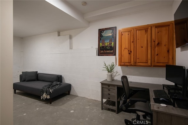 office space featuring concrete floors