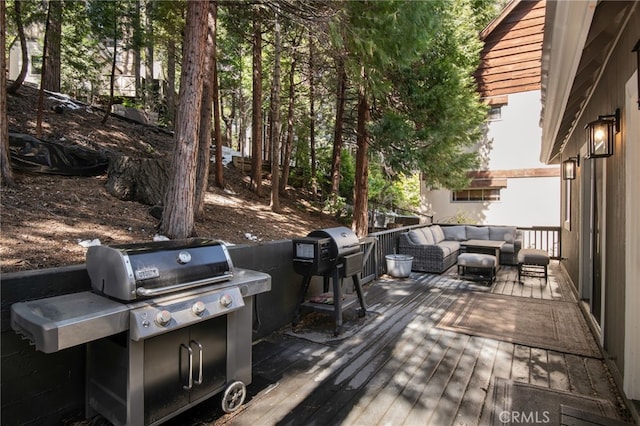 wooden deck featuring grilling area and outdoor lounge area