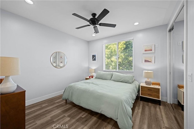 bedroom with baseboards, a ceiling fan, wood finished floors, and recessed lighting