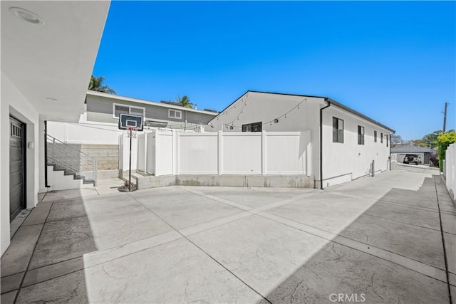 view of patio / terrace with fence