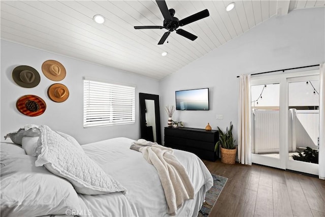 bedroom featuring vaulted ceiling, wood finished floors, access to exterior, and recessed lighting