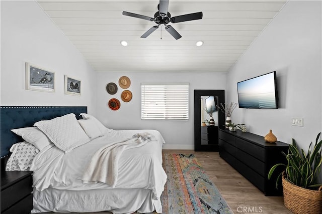 bedroom with recessed lighting, light wood finished floors, wooden ceiling, baseboards, and ceiling fan