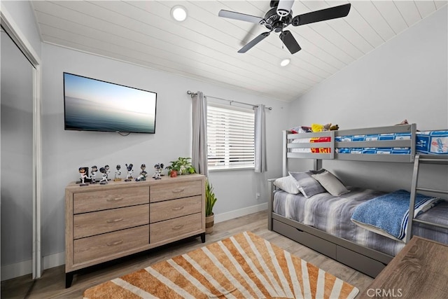 bedroom with recessed lighting, wood finished floors, baseboards, and wooden ceiling
