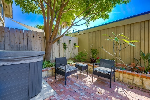 view of patio / terrace with fence