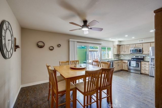 dining room featuring recessed lighting, ceiling fan, dark wood-type flooring, visible vents, and baseboards