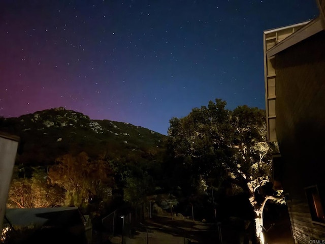 exterior space featuring a mountain view