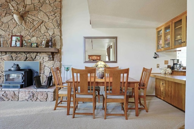 8551 Foothill Blvd, Pine Valley, CA 91962 - carpeted dining area with a wood stove and a textured ceiling