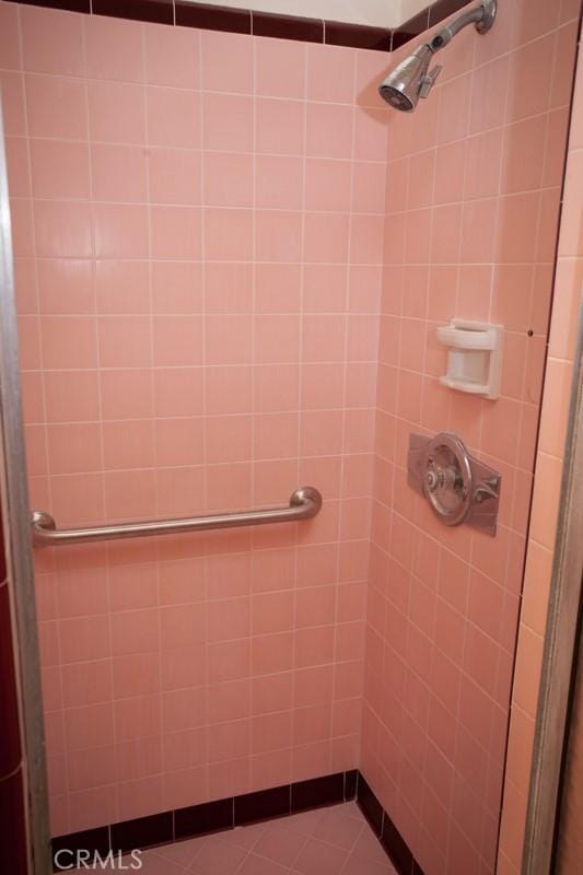 bathroom featuring a stall shower