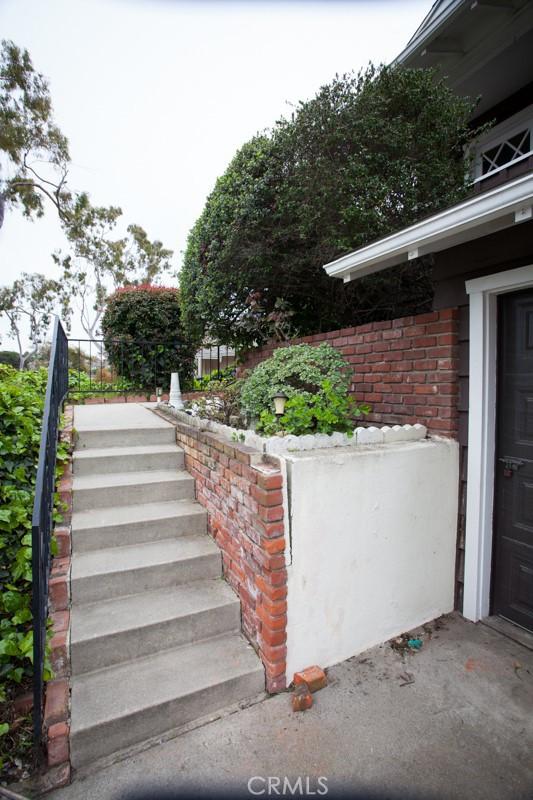 view of home's exterior with brick siding