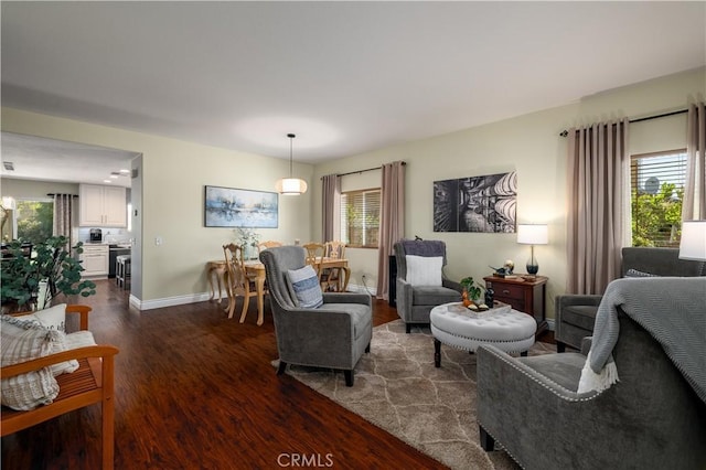33077 Monte Dr, Temecula, CA 92592 - living area featuring dark wood-type flooring and baseboards