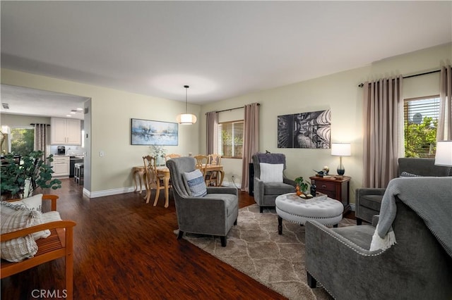 33077 Monte Dr, Temecula, CA 92592 - living area with dark wood-style floors and baseboards