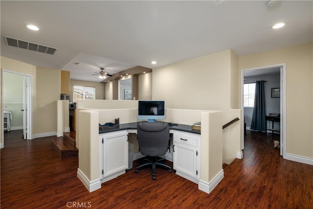 33077 Monte Dr, Temecula, CA 92592 - home office featuring visible vents, dark wood-style floors, and plenty of natural light