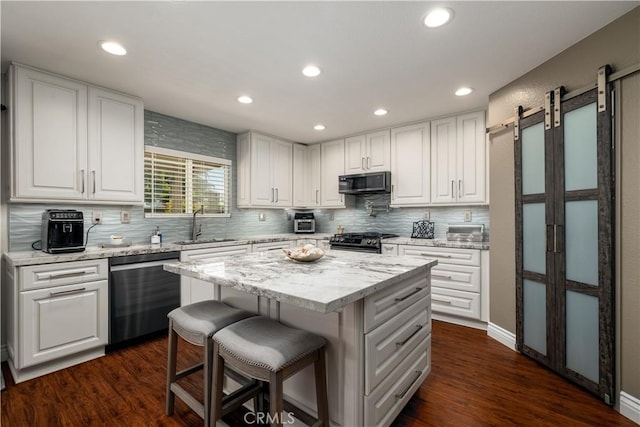 33077 Monte Dr, Temecula, CA 92592 - kitchen with a sink, appliances with stainless steel finishes, and white cabinets