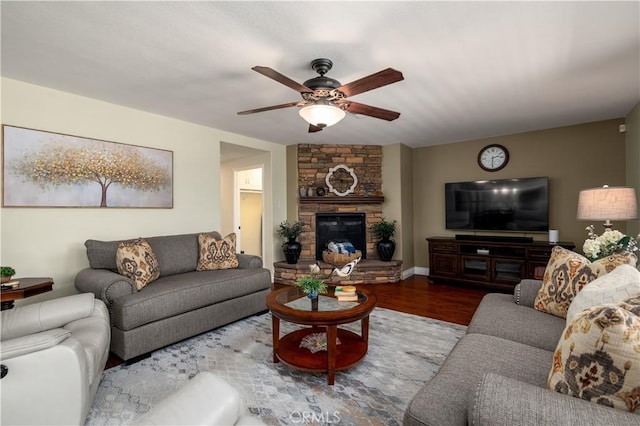 33077 Monte Dr, Temecula, CA 92592 - living room featuring baseboards, a ceiling fan, wood finished floors, and a fireplace