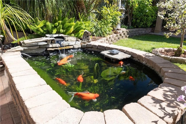 33077 Monte Dr, Temecula, CA 92592 - view of yard featuring a garden pond