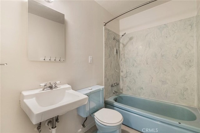 full bathroom featuring toilet, shower / washtub combination, and a sink