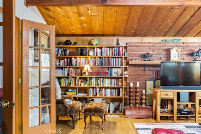 sitting room featuring wood finished floors and wood ceiling