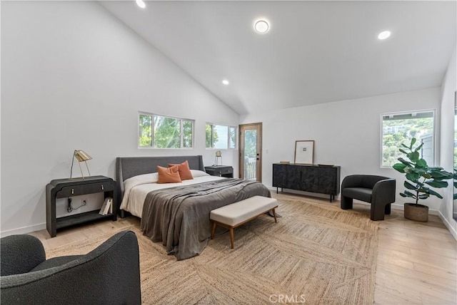 bedroom with recessed lighting, high vaulted ceiling, baseboards, and light wood-type flooring