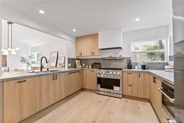 kitchen with a sink, open shelves, stainless steel appliances, and light brown cabinets