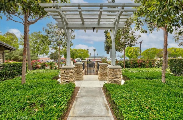 surrounding community with a gate, a pergola, and fence private yard