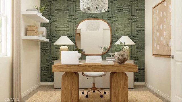 carpeted office space featuring baseboards