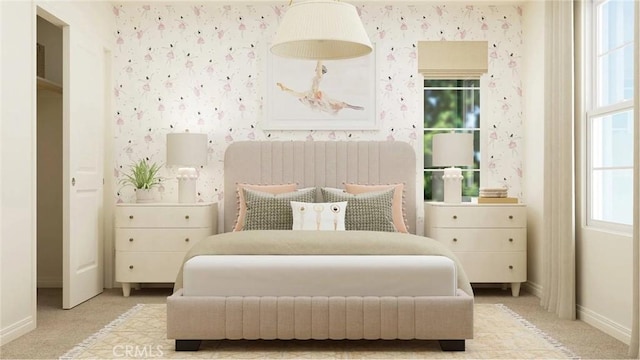 bedroom with wallpapered walls, carpet flooring, and baseboards