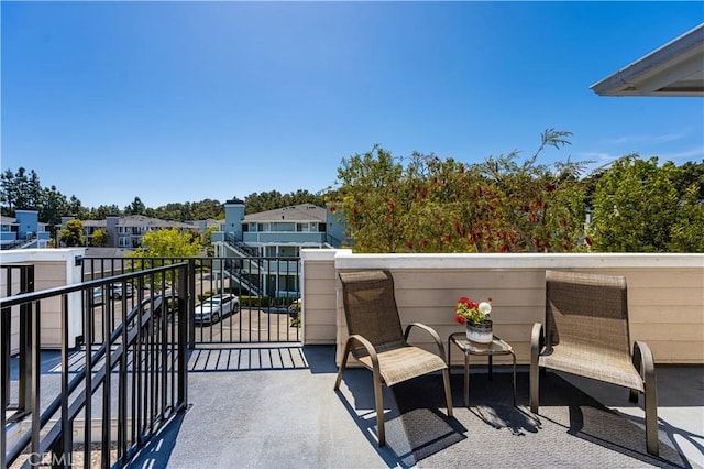 balcony featuring a residential view