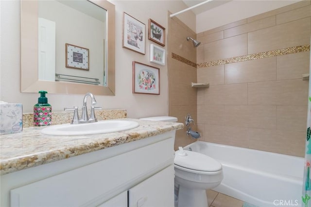 full bath featuring tile patterned flooring, shower / tub combo, toilet, and vanity