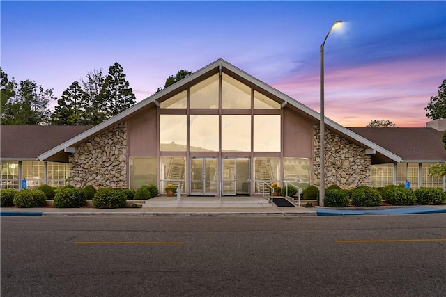 view of property at dusk