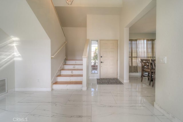 10917 Breezy Meadow Dr, Moreno Valley, CA 92557 - entryway with baseboards, marble finish floor, and stairs