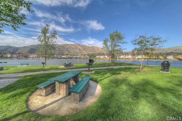 10917 Breezy Meadow Dr, Moreno Valley, CA 92557 - view of community featuring a lawn and a water and mountain view