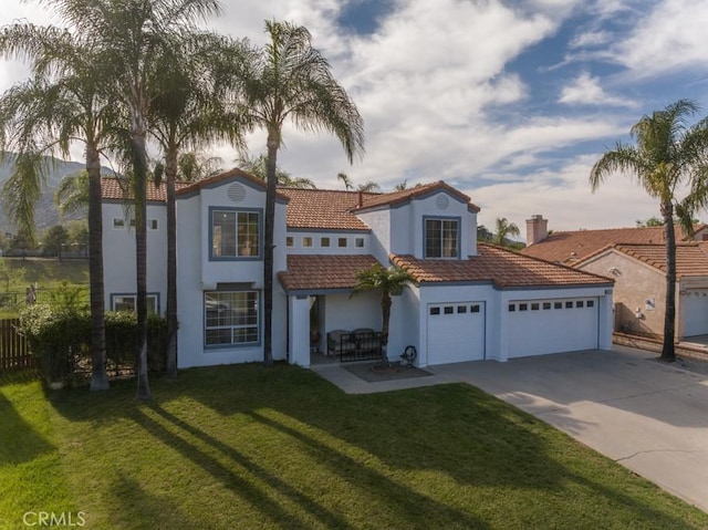10917 Breezy Meadow Dr, Moreno Valley, CA 92557 - mediterranean / spanish home featuring a tiled roof, stucco siding, an attached garage, concrete driveway, and a front yard
