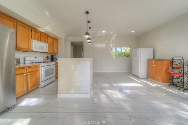 10917 Breezy Meadow Dr, Moreno Valley, CA 92557 - kitchen featuring light countertops, marble finish floor, baseboards, and white appliances