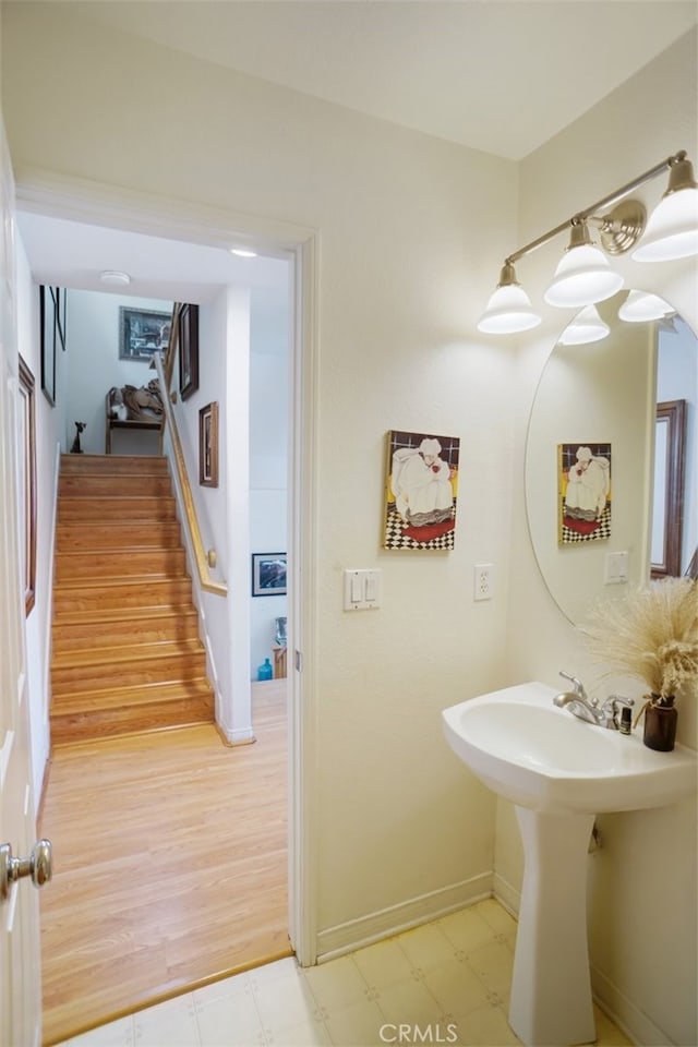bathroom featuring tile patterned floors and baseboards