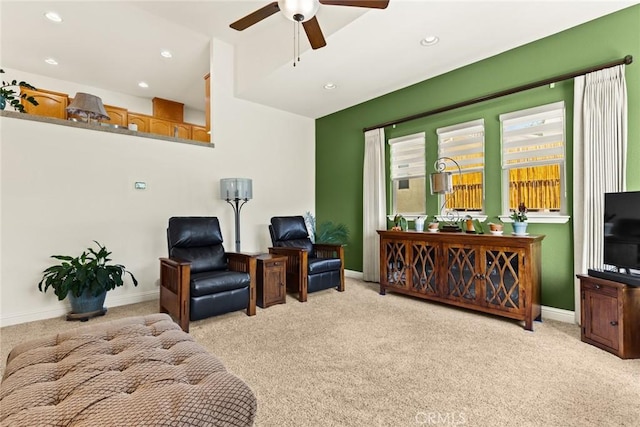 living area featuring baseboards, recessed lighting, carpet, and ceiling fan