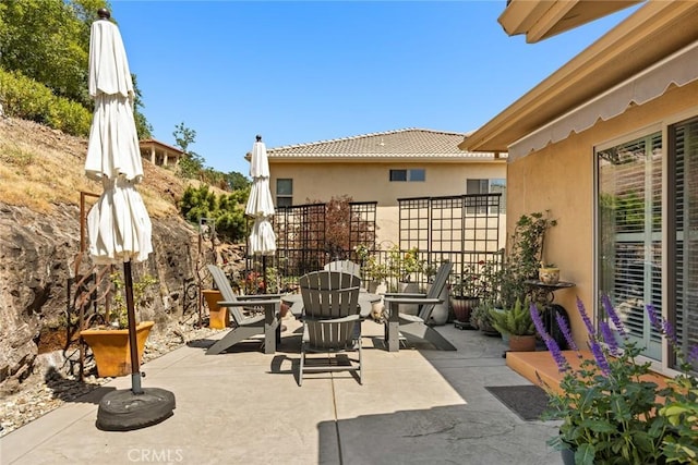 view of patio with fence