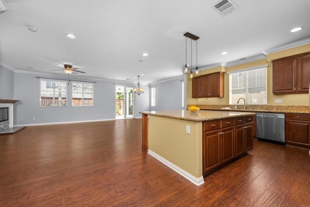 kitchen featuring dark wood-style flooring, visible vents, stainless steel dishwasher, and ornamental molding