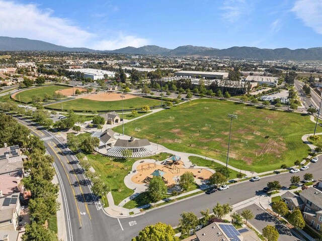 aerial view with a mountain view and a residential view