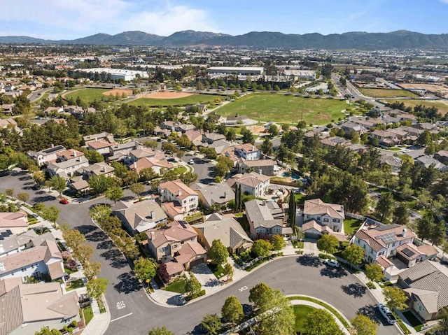 birds eye view of property featuring a residential view and a mountain view