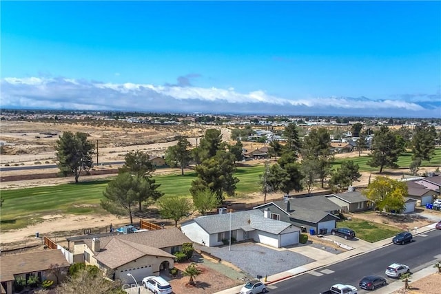 bird's eye view with view of golf course and a residential view