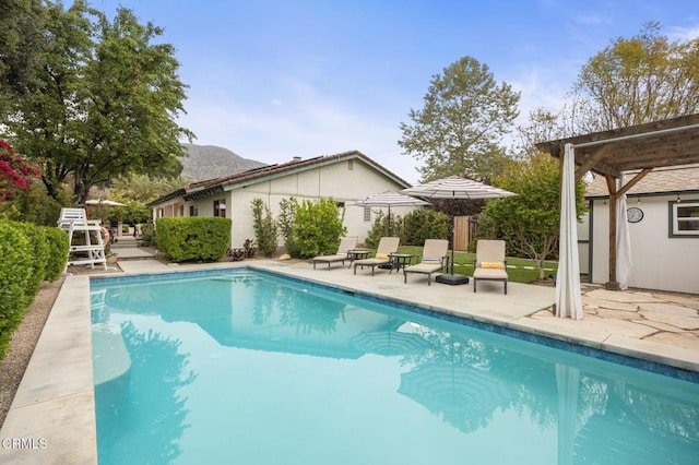 1109 Daly Rd, Ojai, CA 93023 - view of pool featuring a patio area, a mountain view, and a pergola