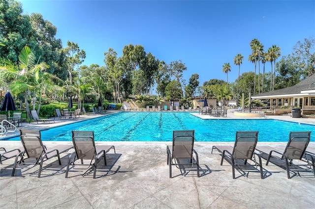 pool featuring a patio area