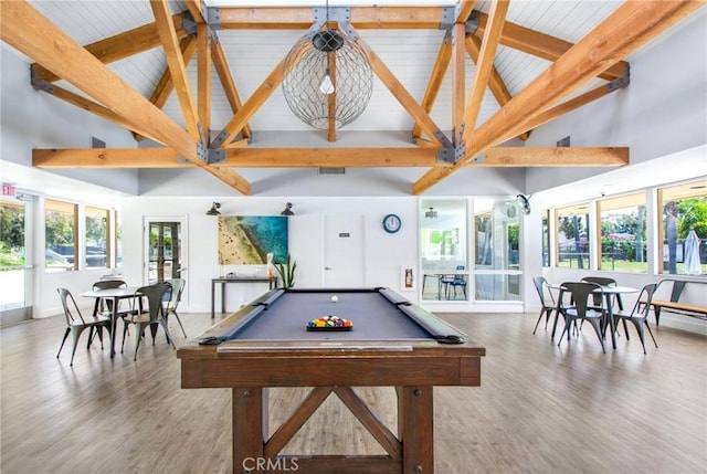 recreation room with wood finished floors, beam ceiling, high vaulted ceiling, and billiards